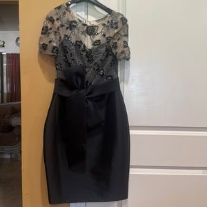 Badgley Mischka  gorgeous contrail dress in new condition.  Gorgeous satin bow.